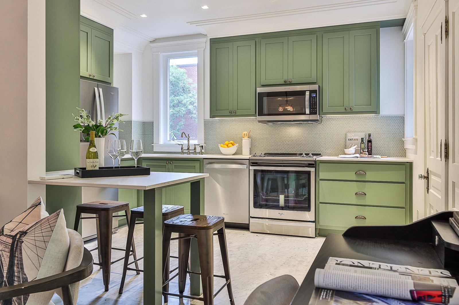 Sage-green kitchen
